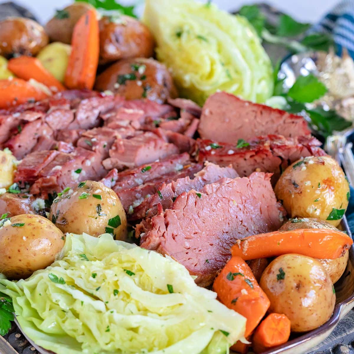https://www.momontimeout.com/wp-content/uploads/2022/03/corned-beef-and-cabbage-slow-cooker-square.jpeg