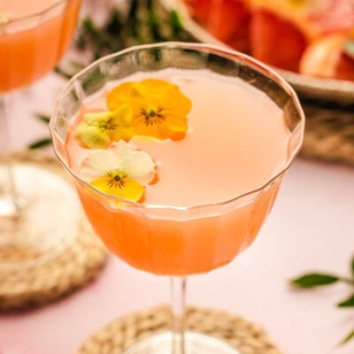 French Blonde Cocktail in a glass with garnishes.