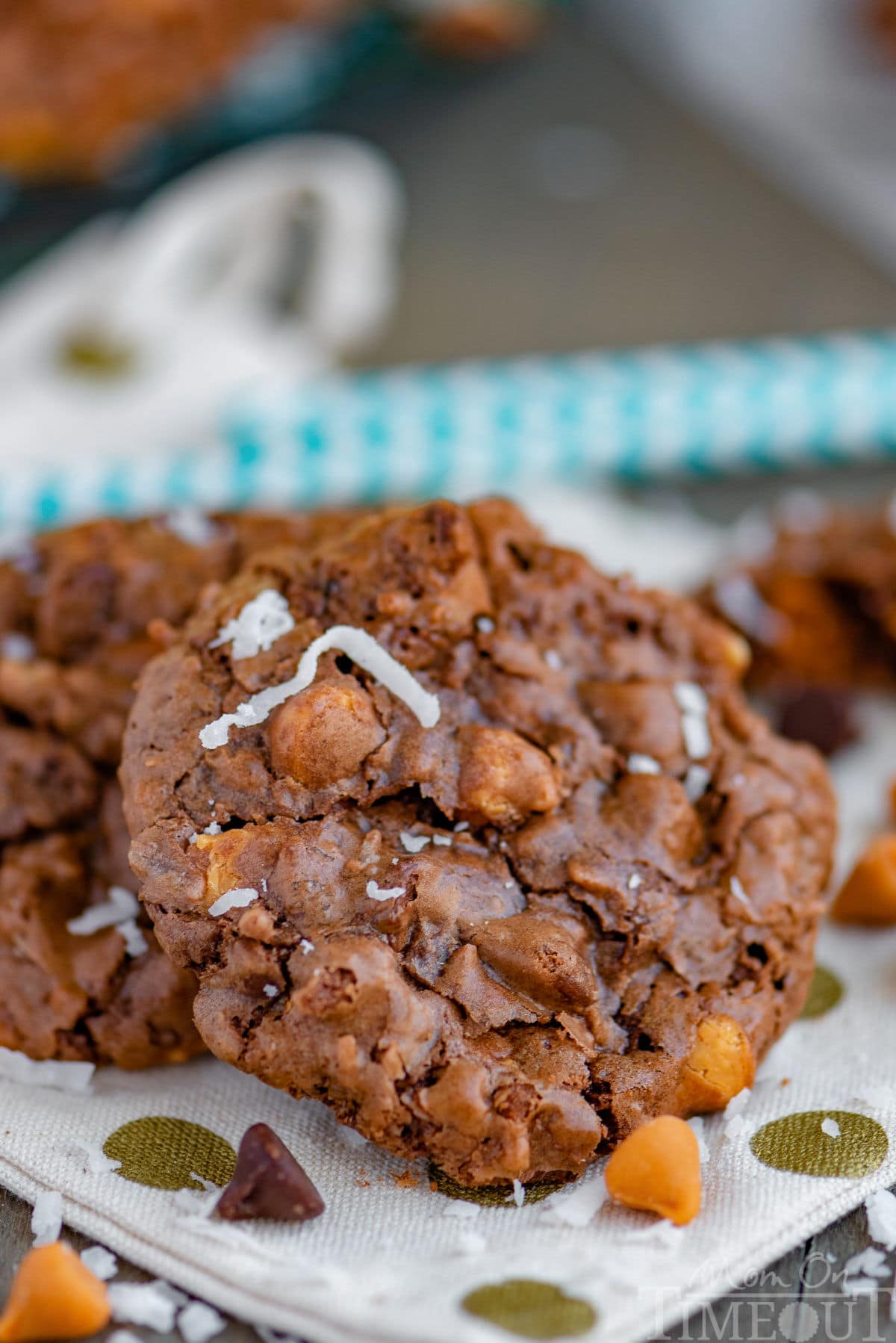 Brownie cookies on a white and green polka dot napkin.