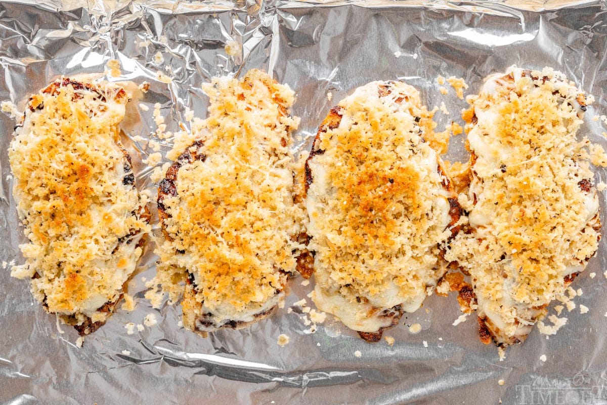 Longhorn Steakhouse Parmesan Crusted Chicken on foil lined pan.