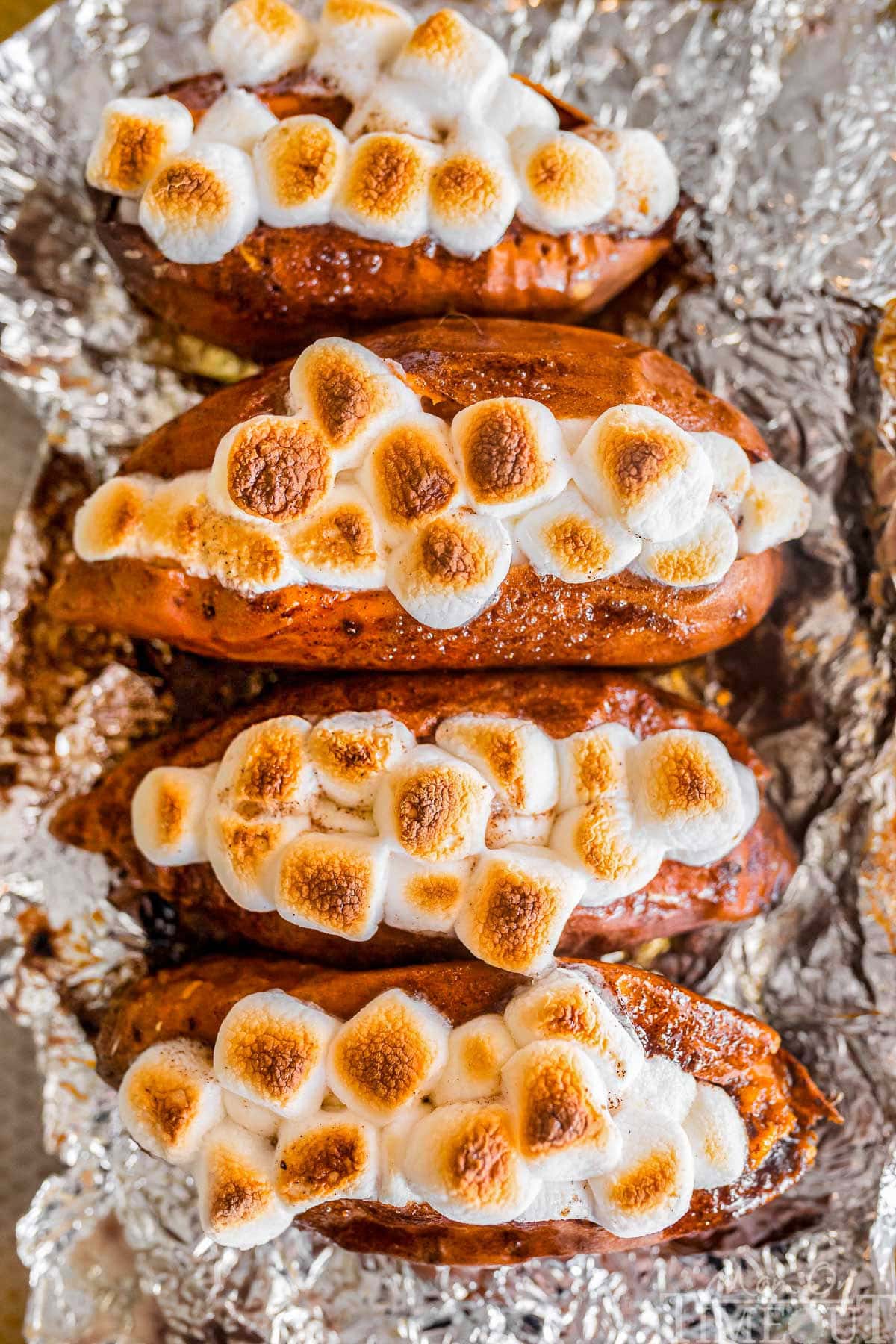 Twice baked sweet potatoes on a piece of aluminum foil.