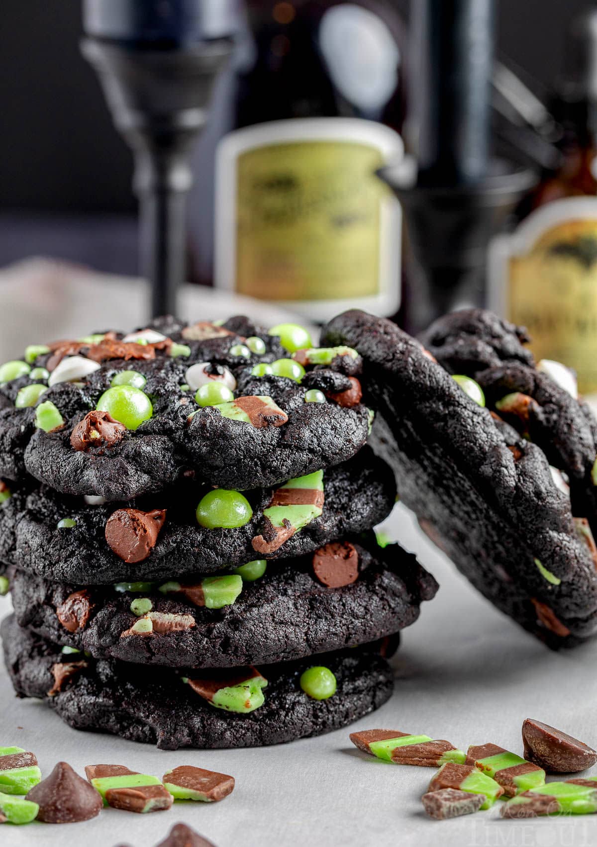 Stack of monster halloween cookies made with mint and chocolate chips. 